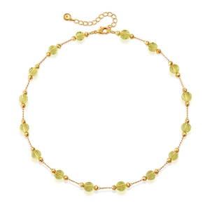 Detail of colorful glass beads necklace with adjustable gold plated lobster clasp chain
