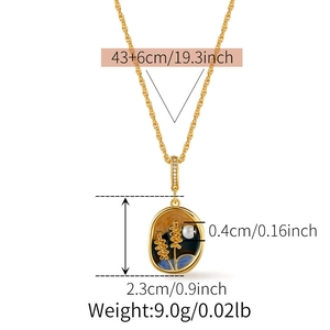 Detail view of oval shell pendant necklace showing 43+6cm length and size specifications