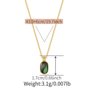 Detail showing dimensions of vintage gold shell pendant with iridescent inlay on necklace