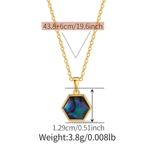Detail showing dimensions of gold necklace with hexagonal shell pendant and iridescent inlay