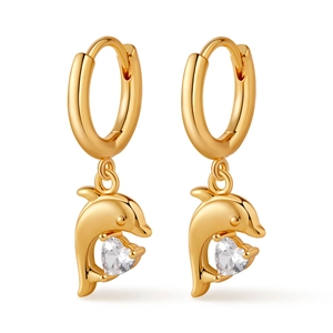 Detail of gold hoop earrings with dolphin charms and heart-shaped cubic zirconia stones
