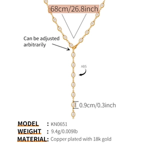 Diagramme de spécifications détaillant les dimensions du collier lariat perlé doré 18K