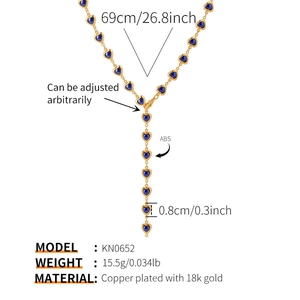 Détails de taille et matériau du collier doré en Y avec pendentifs en forme de cœur bleu