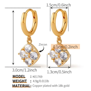 Detailed view of 18k gold plated hoop earrings with zircon geometric square pendants