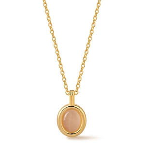 Detailed view of an oval pink quartz pendant with a polished gold-plated bezel setting