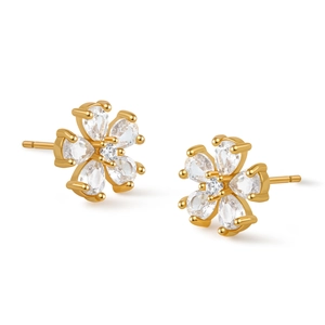 Detailed macro view of gold-plated flower stud earrings with sparkling zircon petals