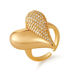 Close-up of vintage heart ring with asymmetric cubic zirconia pavé and gold finish
