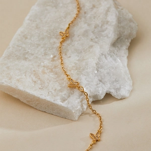 Elegant gold butterfly pendant necklace with zircon micro-paving on a minimalist O-chain