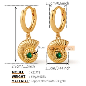 Macro view of 18k gold plated conch earrings with zircon stone and size details