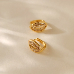 Irregular oval earrings with sparkling cubic zirconia set in 18K gold plated finish