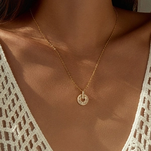 Elegantly layered 18K gold plated circle pendant necklace with sparkling micro-pave crystals