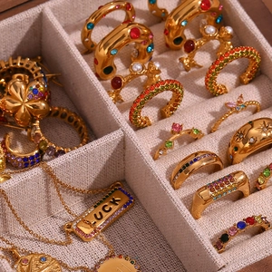 Gold vintage jewelry set with colorful gemstones and Luck engraved pendant necklace