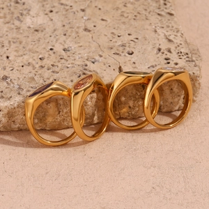 Set of four 18K gold plated stainless steel rings with marquise cut colorful zircons