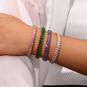 Close-up of luxury marquise cut zircon bracelets in pink green purple and white stones