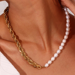Chic gold chain and freshwater pearl asymmetric necklace shown on female model
