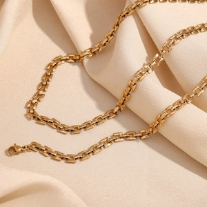Detail of 18K gold-plated stainless steel rectangular link chain with a lobster clasp