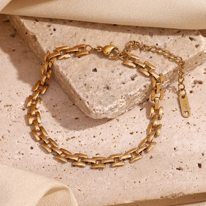 Detail of 18K gold plated rectangular link bracelet with lobster clasp and adjustable chain