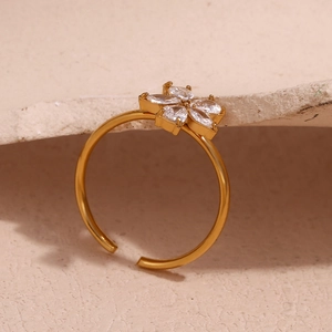 Macro view of 18K gold plated flower ring with sparkling white marquise zircon stones