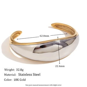 Brazalete bicolor de acero inoxidable con acabado en oro de 18K y plata brillante