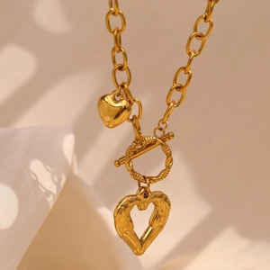 Chunky gold O-chain necklace with double heart pendants and OT toggle clasp closure
