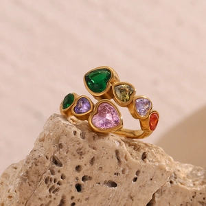 Macro shot of 18K gold plated heart ring featuring colorful cubic zirconia stones