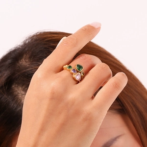 Detail of 18K gold plated stainless steel ring with colorful heart-shaped zircons