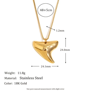 Detail view of 18K gold plated stainless steel shark tooth pendant necklace with dimensions