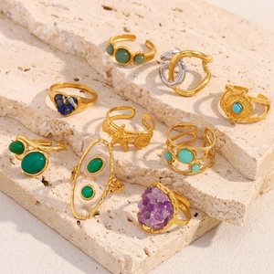 Set of 9 vintage 18K gold-plated stainless steel rings with sea shell and gemstone accents