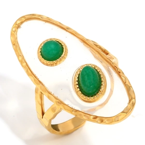 Statement gold hammer textured ring with dual green gemstones in transparent resin