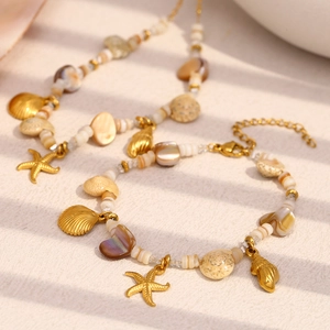 Set collana e bracciale in acciaio inossidabile placcato oro 18K con conchiglie e stella