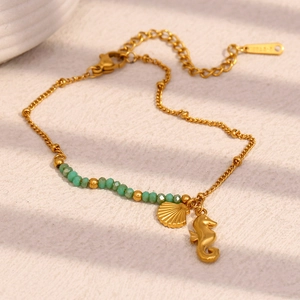 Bracelet en acier inoxydable doré 18K avec breloques hippocampe, coquillage et perles