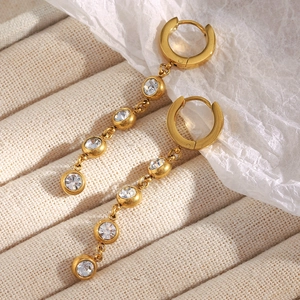 Detail of 18K gold plated stainless steel drop earrings with clear zircon crystals