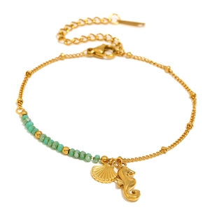 Bracelet en acier inoxydable doré 18K avec breloques hippocampe coquillage et perles