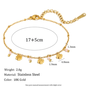 Detail view of 18K gold plated stainless steel clover bracelet with precise size specs