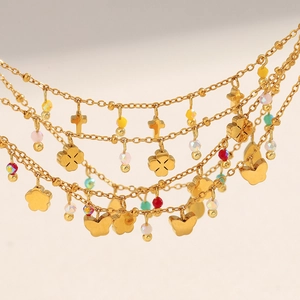 Layered 18K gold plated stainless steel necklace with crystal beads and charms