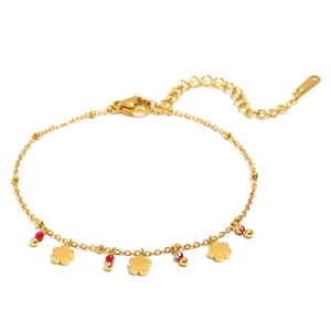18K gold plated stainless steel bracelet with red beads and flower charms on white background