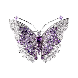 Broche papillon exquise avec cristaux violets et blancs sur une base en métal argenté