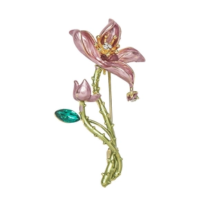 Elegant gold flower brooch with purple enamel petals and sparkling white rhinestones