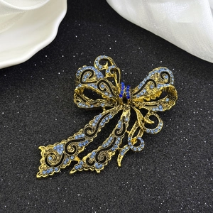 Vintage Luxury Bowknot Brooch Pin For Women Gold Plated Alloy Rhinestone Cut-out Ribbon Brooch For Wedding Banquet Party Jewelry