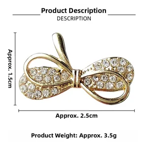 Detailed size view of gold bow brooch featuring white rhinestones and measurements