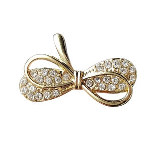 Elegant gold bow brooch with sparkling crystal rhinestones for women clothing decoration