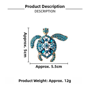 Tableau détaillé des tailles de la broche tortue dorée avec strass bleus et dimensions de 5cm