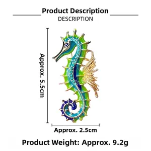 Macro shot of colorful seahorse brooch with enamel finish and blue rhinestones inlay