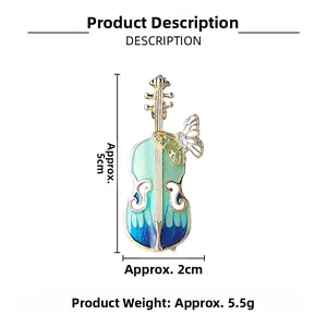Detailed view of the vintage blue violin brooch with dimensions of 5cm by 2cm and weight
