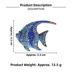 Macro detail of tropical fish brooch with blue gradient crystals and size dimensions
