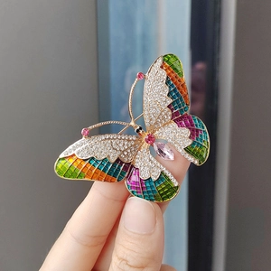 Exquisite butterfly brooch with colorful crystals and rhinestones in gold setting