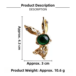 Detailed view of rabbit brooch with green stone and dimensions 4.3cm by 3cm