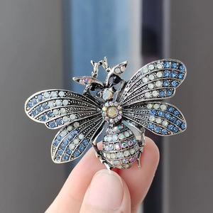 Elegant vintage insect bee brooch with blue crystals and antique silver alloy finish