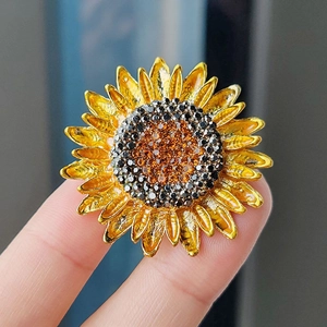 Broche tournesol exquise avec strass orange étincelants et des pétales jaunes