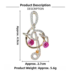 Detail of music note brooch dimensions 4.9cm by 2.7cm with gold base and crystals
